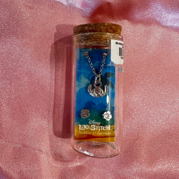 Disney Jewelry - Disney Stich necklace and earrings in a bottle